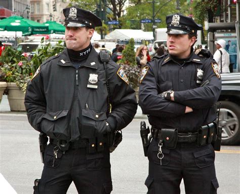 police detective wearing black jacket.